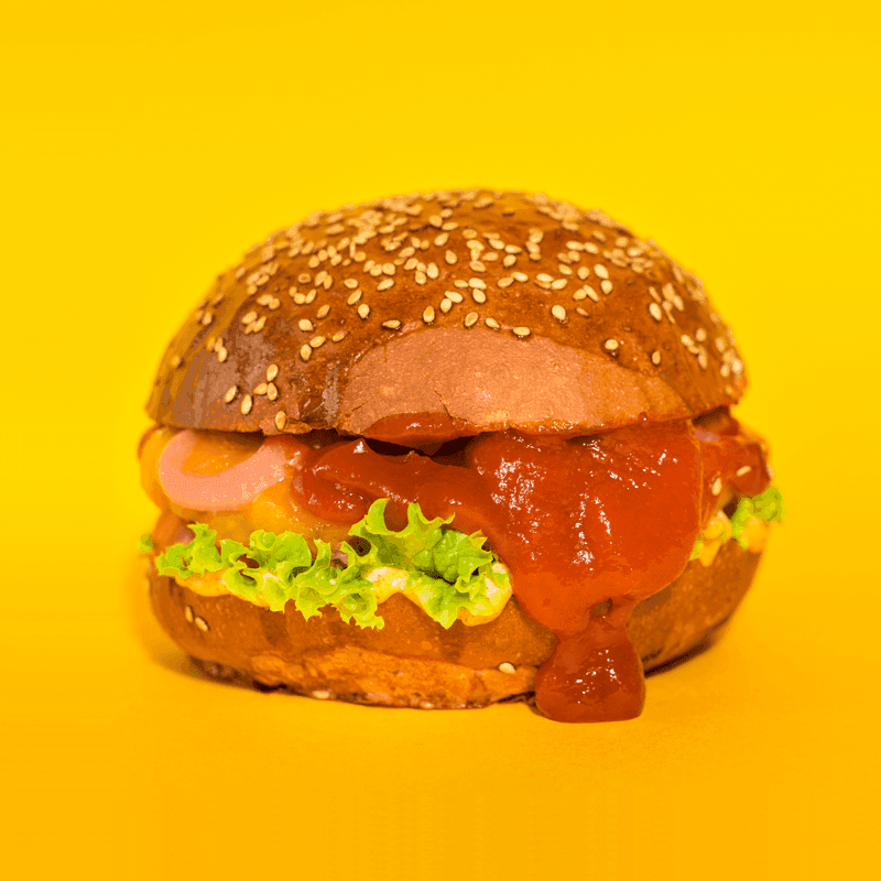 A savory lamb burger with fresh herbs and spices